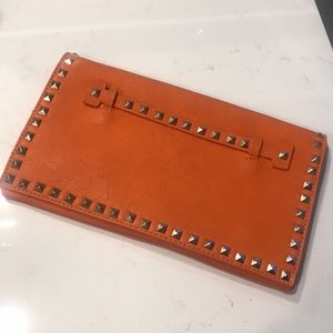 Orange studded clutch ♣️
